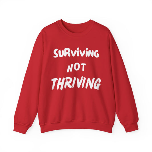 Surviving NOT Thriving w/White writing - Unisex Heavy Blend™ Crewneck Sweatshirt